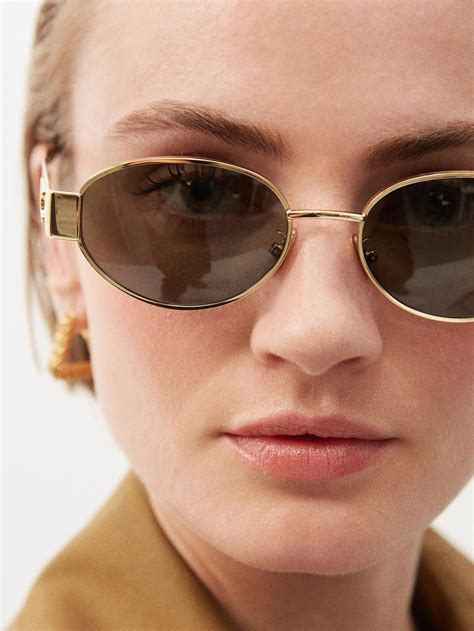 celine triomphe sunglasses rose gold|Celine.